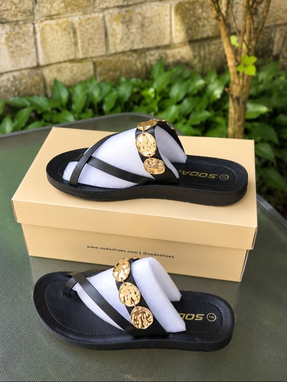 Soda Women’s Black Sandal with Gold Medallion Accents